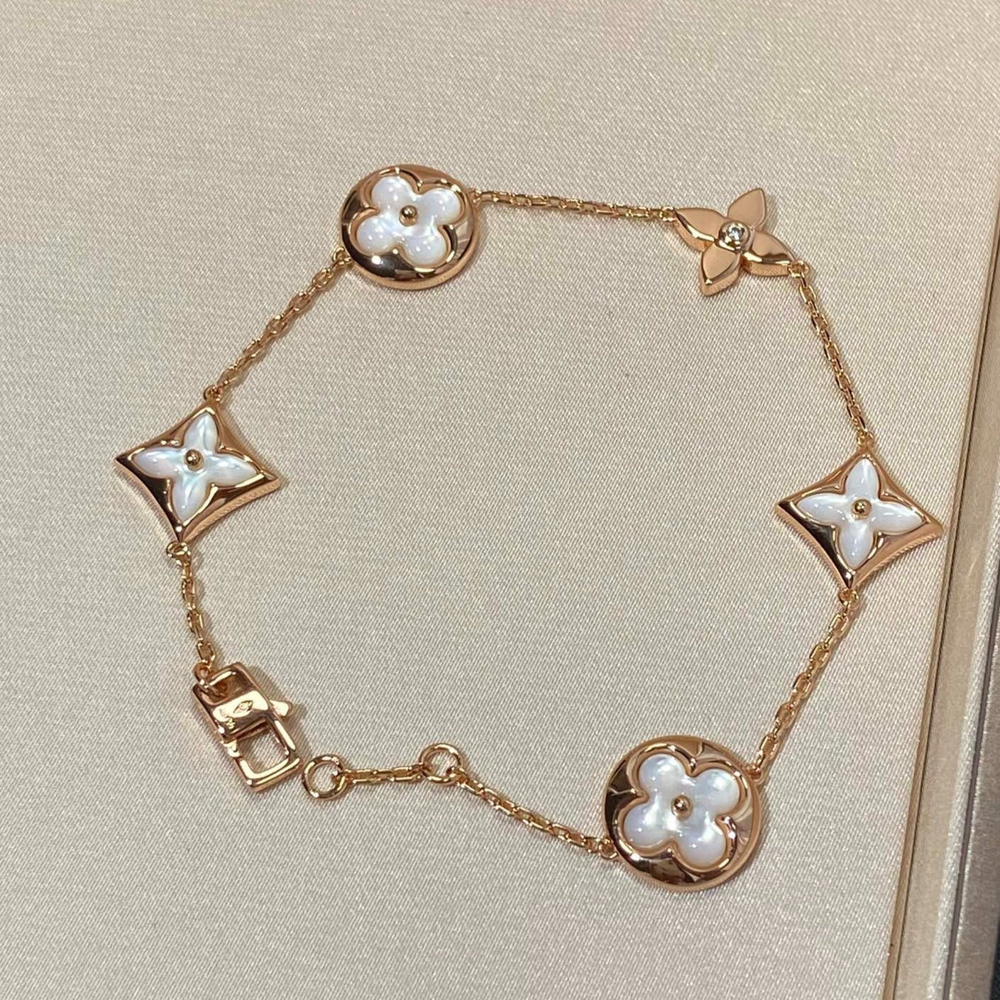 [Rose Tomorrow]STAR AND SUN 5 MOTIF MOP PINK GOLD BRACELET