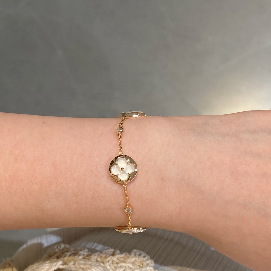 [Rose Tomorrow]STAR AND SUN 4 MOTIF WHITE MOP PINK GOLD BRACELET