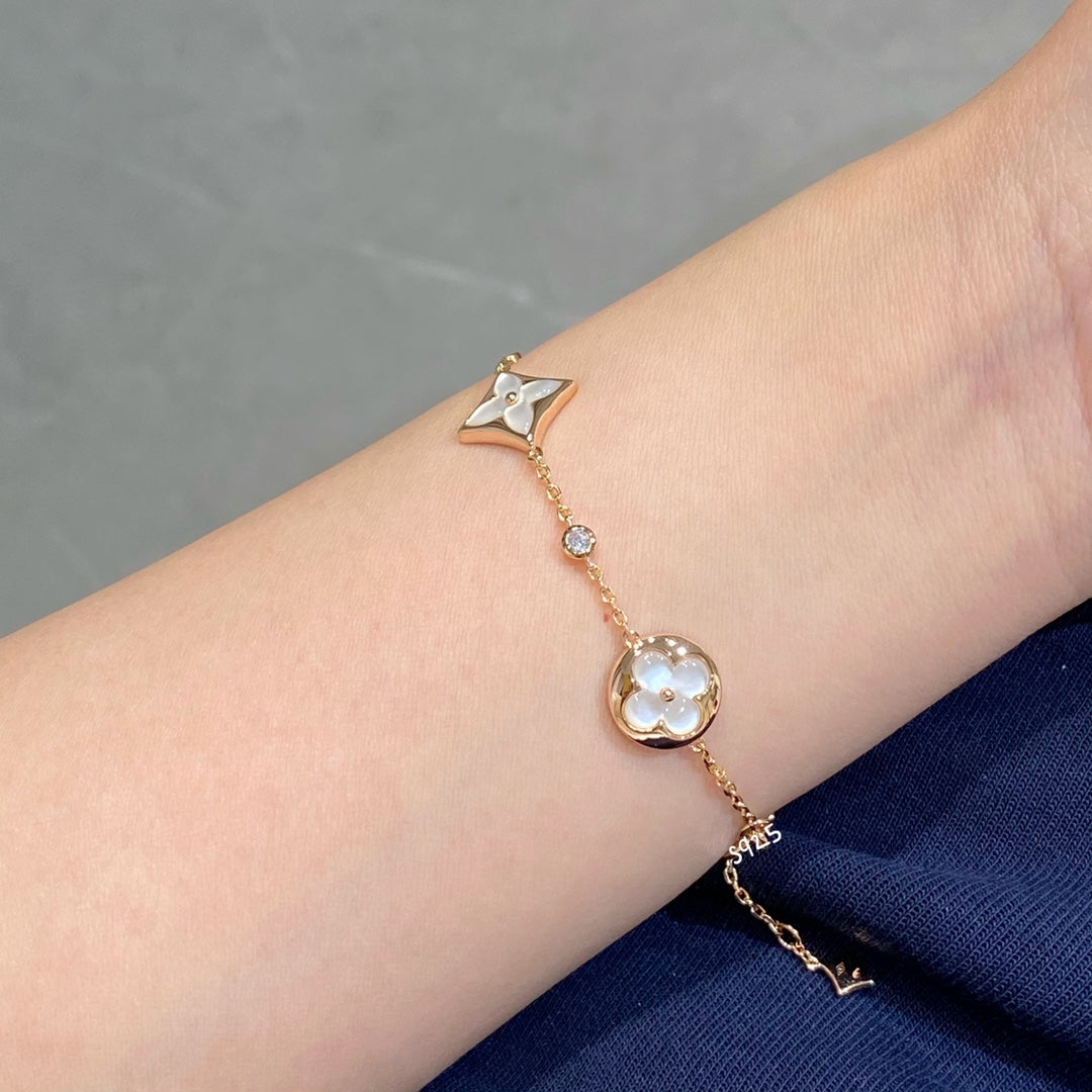 [Rose Tomorrow]STAR AND SUN 4 MOTIF WHITE MOP PINK GOLD BRACELET