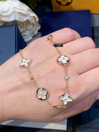 [Rose Tomorrow]STAR AND SUN 4 MOTIF WHITE MOP PINK GOLD BRACELET